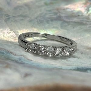 One half carat Five stone CZ band set in sterling silver